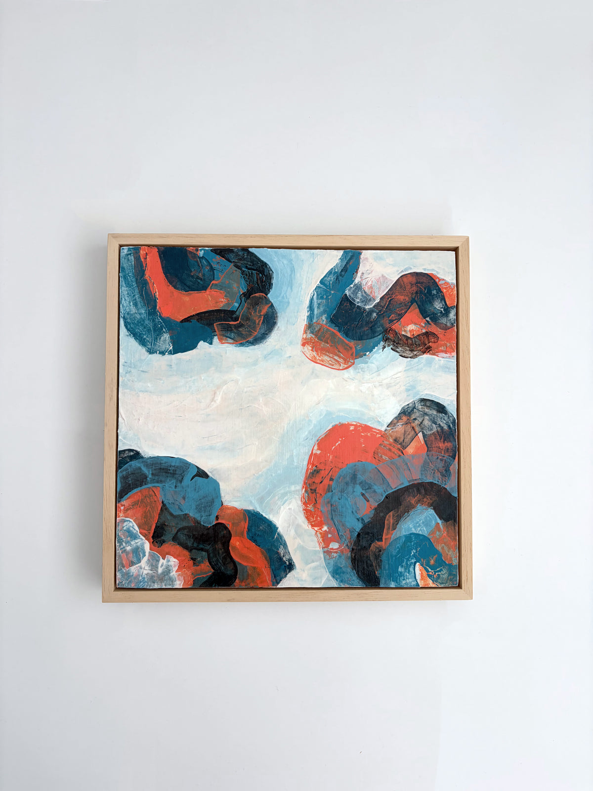 Original abstract acrylic painting "Breaking Formation" from The Sublime Horizon collection, in navy, orange and charcoal, by Rugby-based artist Olivia Miles
