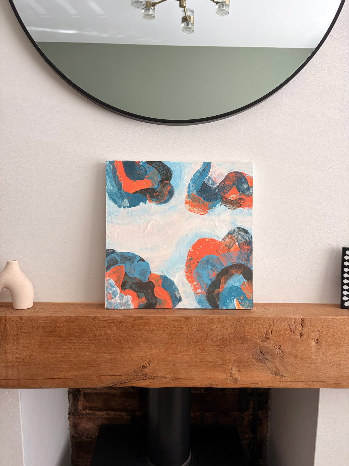 Original abstract acrylic painting "Breaking Formation" from The Sublime Horizon collection, in navy, orange and charcoal, by Rugby-based artist Olivia Miles