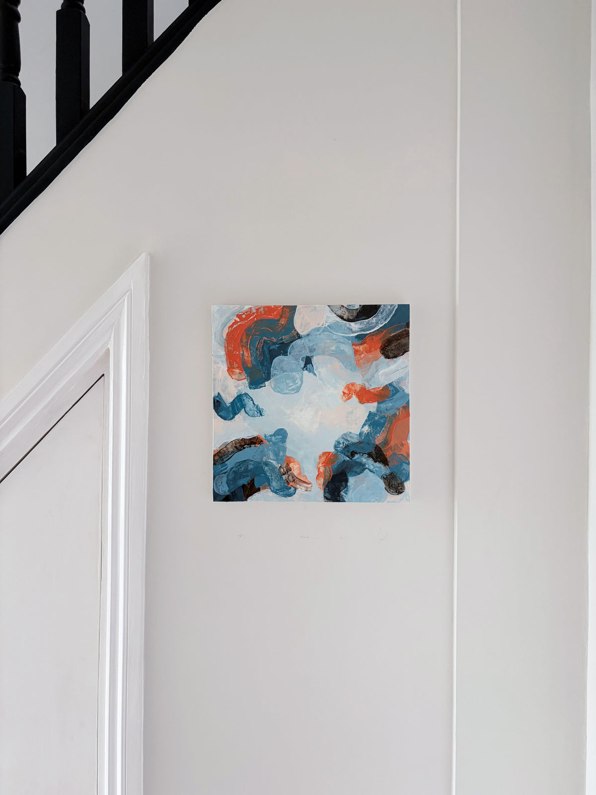 Original abstract acrylic painting "Everything, All At Once" from The Sublime Horizon collection, in pale blue, navy and burnt orange, by Rugby-based artist Olivia Miles