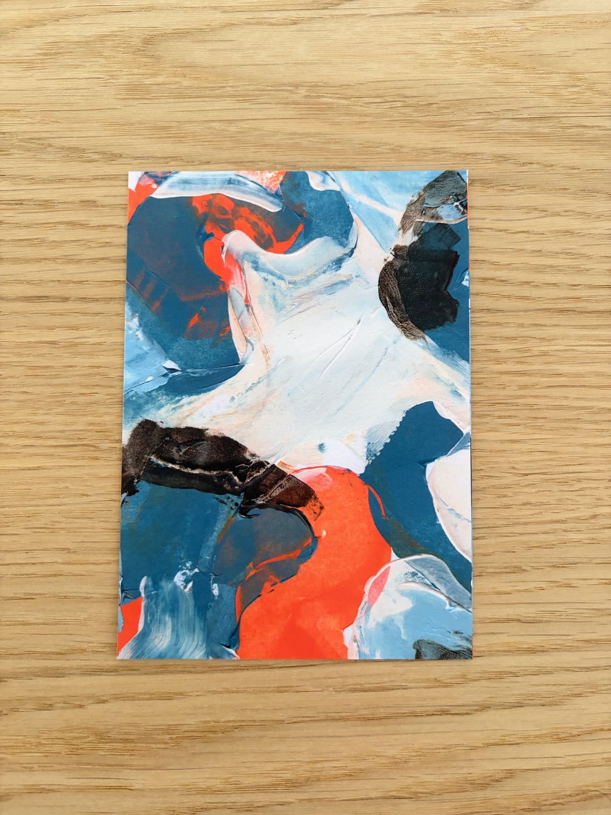Sublime Horizon art postcard print in navy, blue, orange and white, by Rugby-based artist Olivia Miles