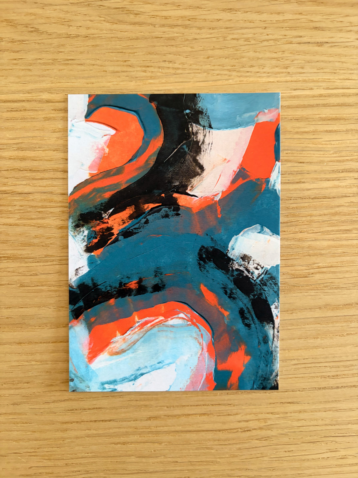 Sublime Horizon art postcard print in teal, black and vivid orange, by Rugby-based artist Olivia Miles
