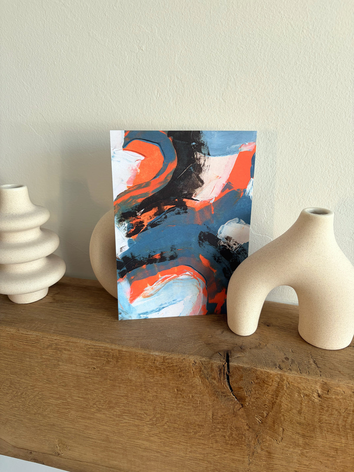 Sublime Horizon art postcard print in teal, black and vivid orange, by Rugby-based artist Olivia Miles