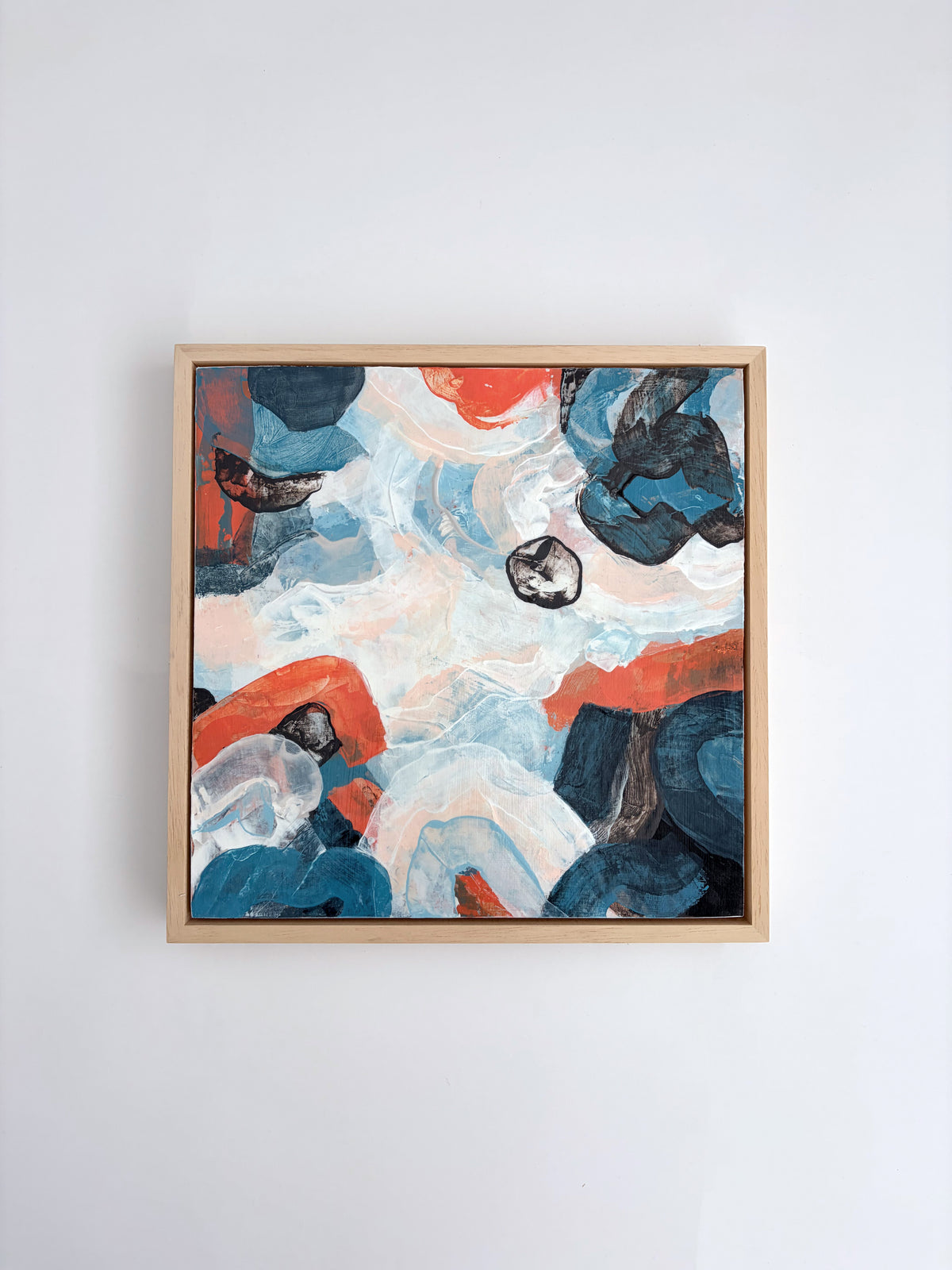 Original abstract acrylic painting "Under a Restless Sky" from The Sublime Horizon collection, in navy, charcoal and burnt orange on a pale ground, by Rugby-based artist Olivia Miles