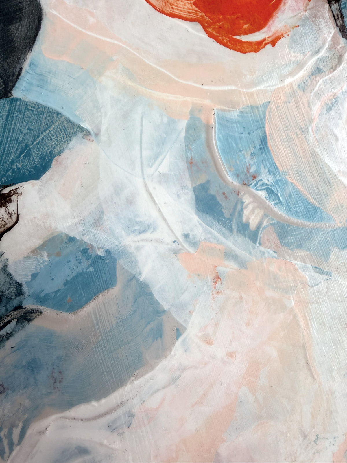 Abstract painting with textured brushstrokes in light blue, white, blush pink, and a bold orange-red area near the top.