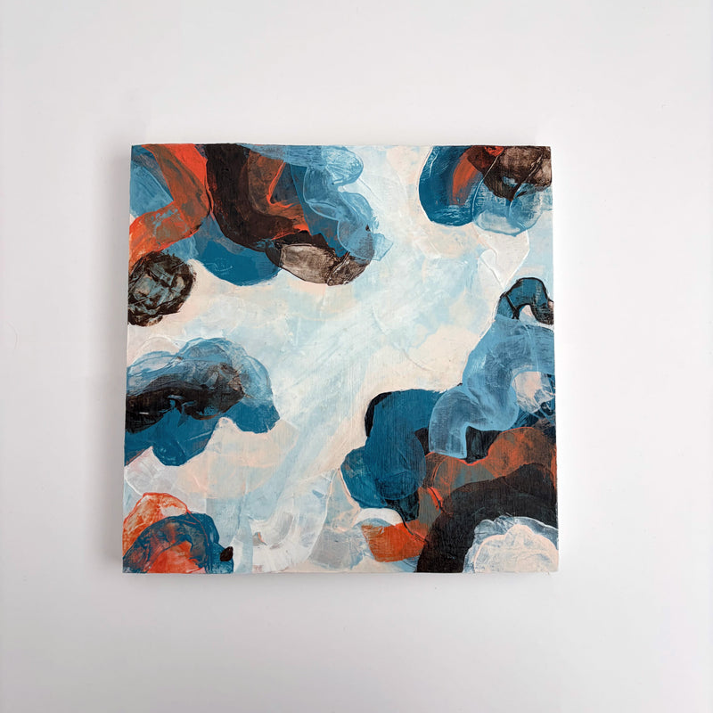 Original abstract acrylic painting "Where the Sky Splits" from The Sublime Horizon collection, in blue, charcoal and burnt orange, by Rugby-based artist Olivia Miles
