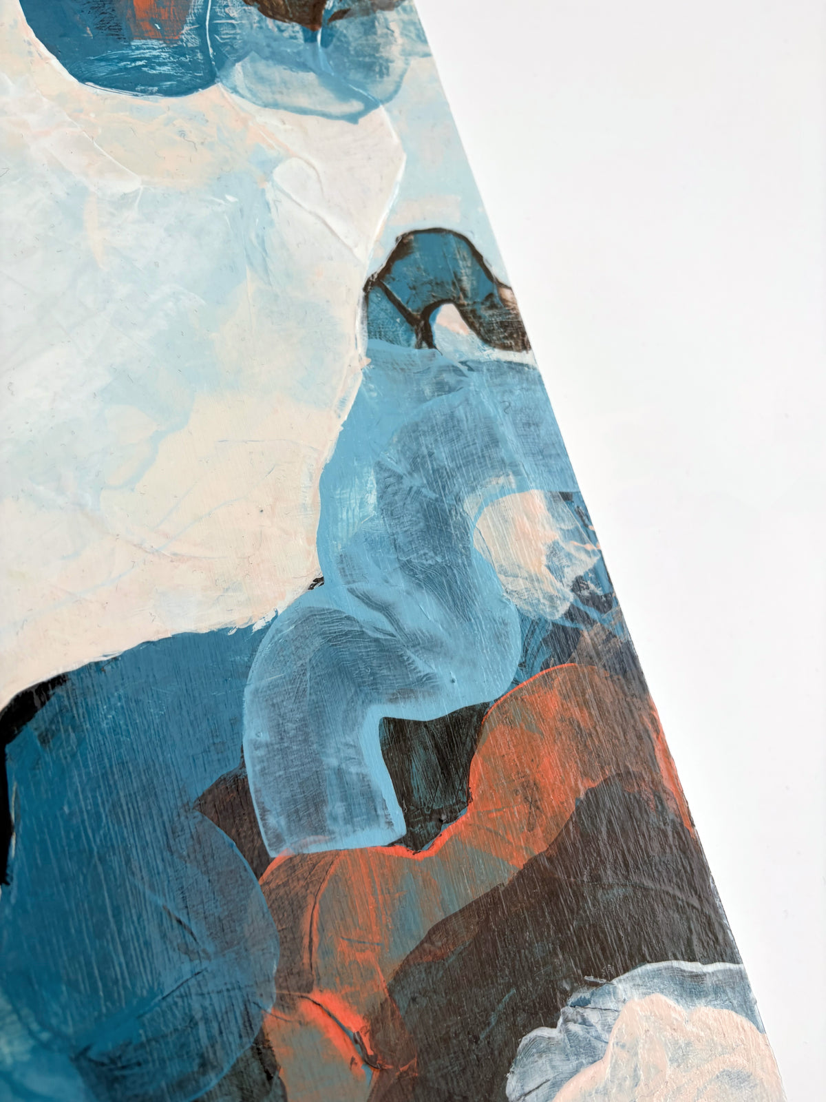 Abstract painting with textured brushstrokes in shades of blue, white, orange, and brown, on a white background.