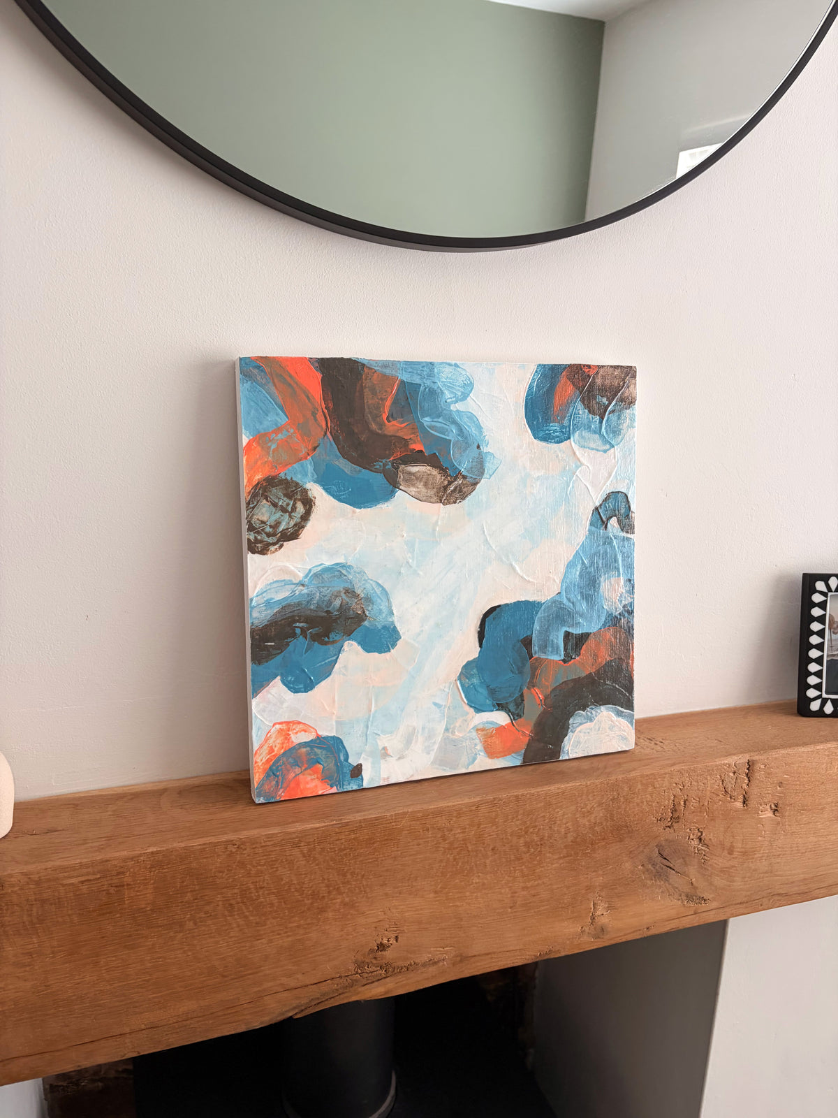 Original abstract acrylic painting "Where the Sky Splits" from The Sublime Horizon collection, in blue, charcoal and burnt orange, by Rugby-based artist Olivia Miles